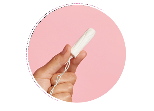 A hand holding a clean tampon against a pink backdrop.